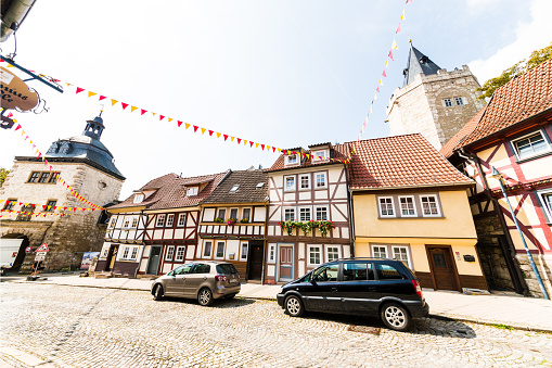 Medieval city of Mühlhausen, Thuringia - also known as the Rothenburg of Thuringia but compared to this it was not destroyed in the World War II and so it is all originally from the middle ages. The city is decorated in preparation for the kermis (german Kirmes) - the largest in Germany. At the left the inner tower \