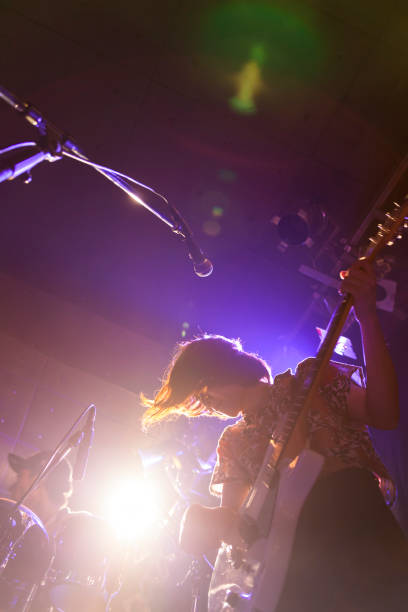 istock Woman Playing The Guitar 840459058