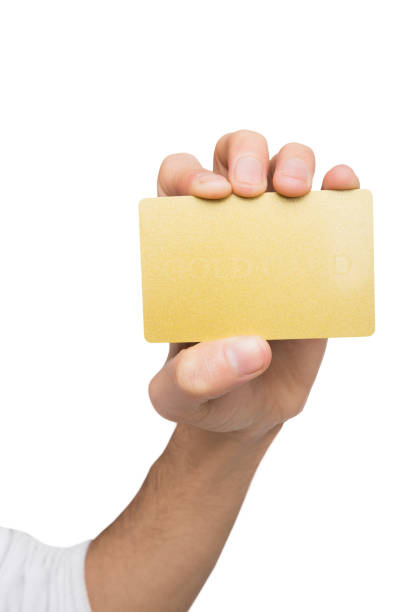 istock Male hand holding blank plastic card isolated on white 840461644