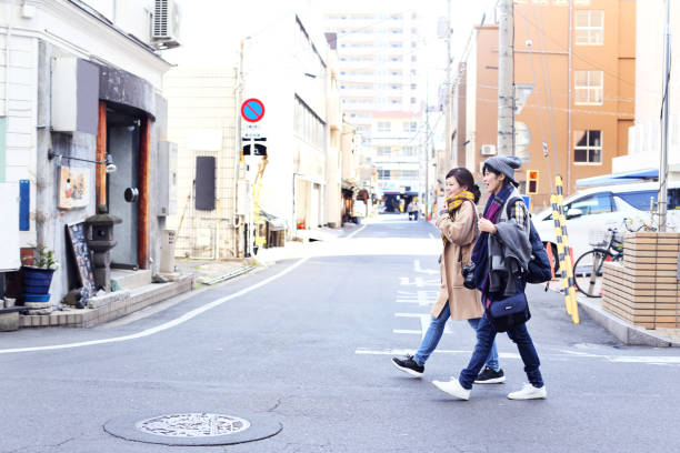 istock Women strolling in the downtown 840461678