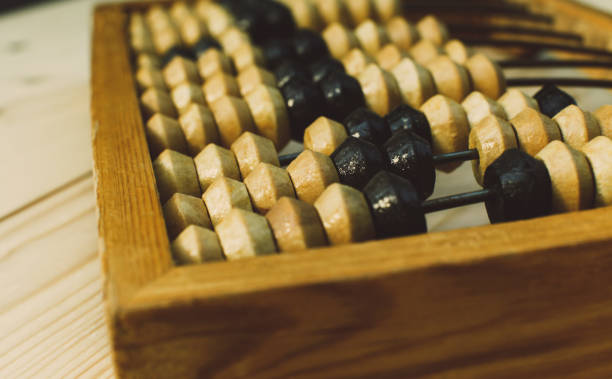 istock Old vintage abacus (calculating frame) close up shot, accounting abstract 840462410