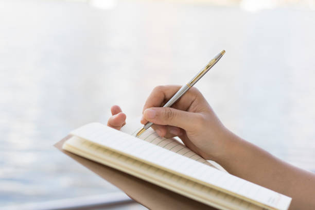 istock Writing dairy on notebook on chair, concept as memory of life and education 840465202