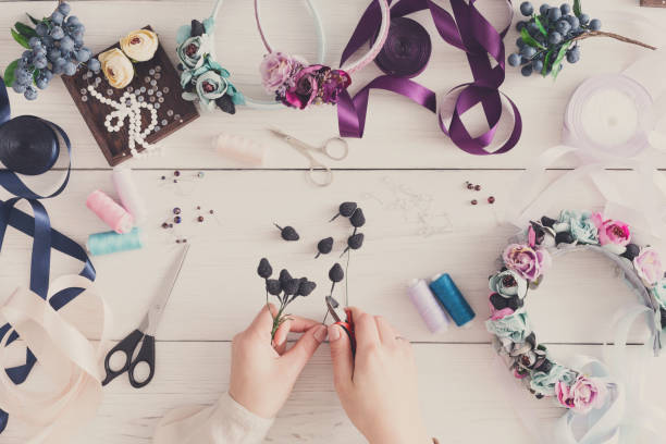 istock Master making handmade jewelry, top view 840465522