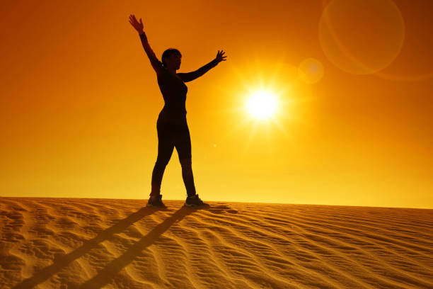 istock female silhouette on a dune 840465560