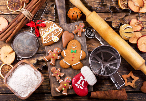 istock Christmas gingerbread man cookies with ingredients for cooking 840468858