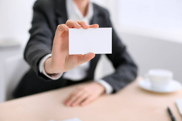 istock Business woman giving visit card 840472264