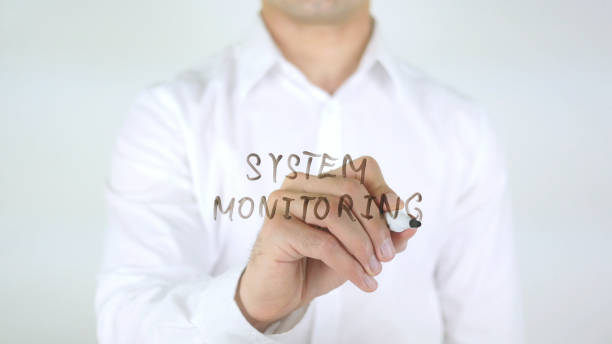 istock System Monitoring, Man Writing on Glass 840478344