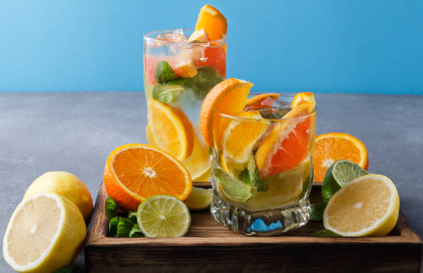 istock Colorful summer background with citrus drinks and fruits 840485794