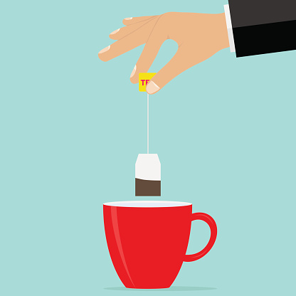 The hand holds a teabag over the cup. Brew tea. Flat design, vector illustration, vector.