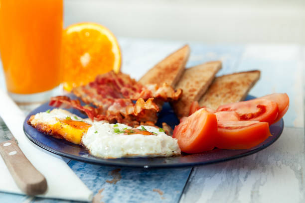 istock Tasty morning breakfast with fried eggs and bacon 840488872