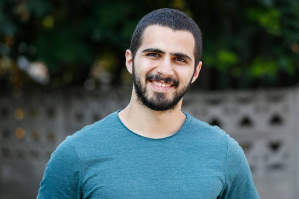 istock Portrait of smiling young man 840493160