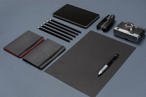 istock Set of black office stationery on a gray background, flat lay 840493642