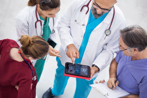 istock Medical team discussing in clinic 840509456