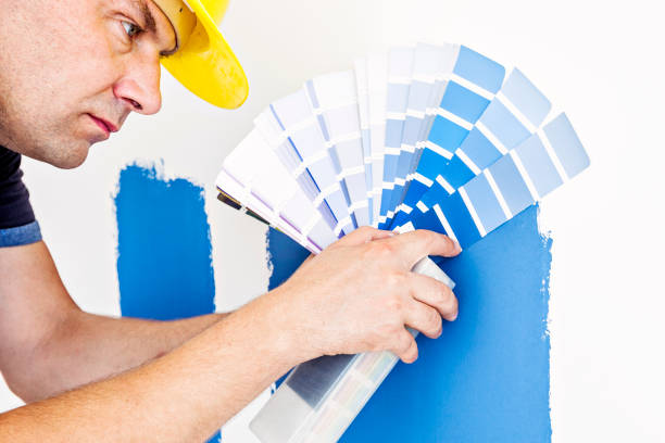 istock Worker choosing paint colors at home 840512492