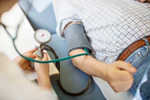 istock Blood pressure measuring at doctor's office 840512964