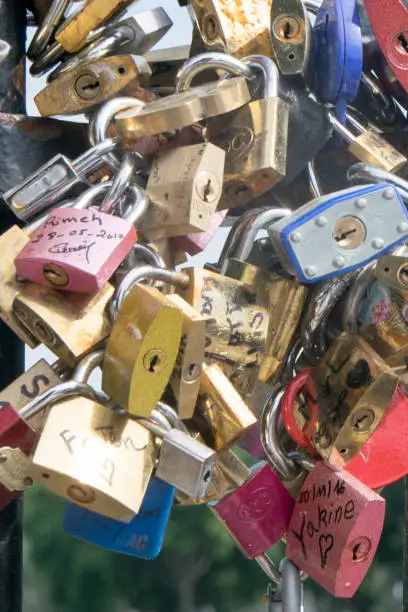 Many lovelocks left at Seine bridges by lovers from all around the world in Paris, France