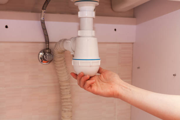 istock Clearing of blocked hammered polluted plastic U siphon for wash basin, sanitary devices, plumbing fixtures special means cleanser. Plumbing siphon. White plumbing siphon assembly. 840513946
