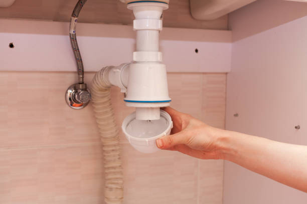 istock Clearing of blocked hammered polluted plastic U siphon for wash basin, sanitary devices, plumbing fixtures special means cleanser. Plumbing siphon. White plumbing siphon assembly. 840514194