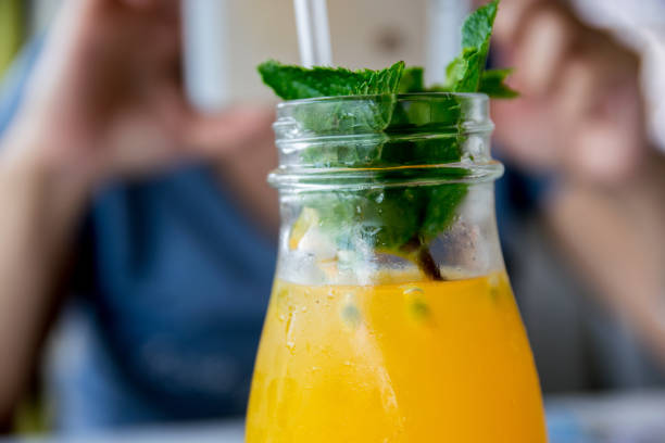 istock tropical cocktail with passion fruit and mint 840514406
