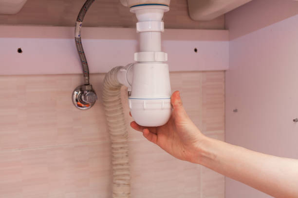 istock Clearing of blocked hammered polluted plastic U siphon for wash basin, sanitary devices, plumbing fixtures special means cleanser. Plumbing siphon. White plumbing siphon assembly 840517580
