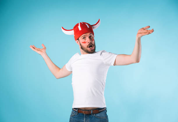 istock The football fan over blue 840522598