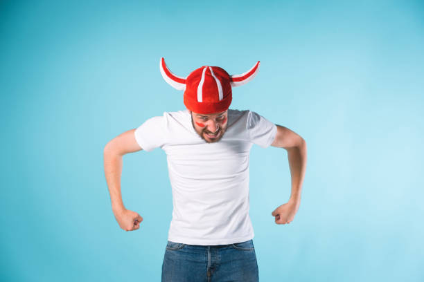 istock The football fan over blue 840522678