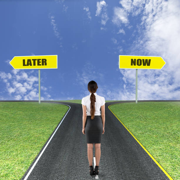 istock Businesswoman thinking about Later or Now 840526654