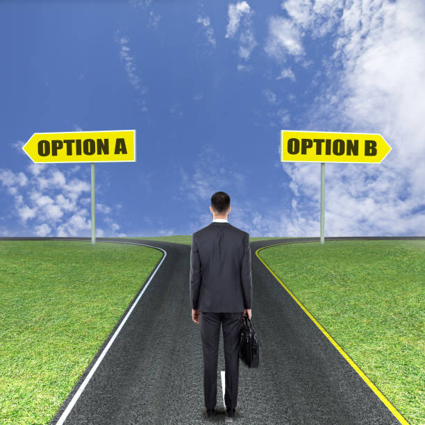istock Businessman thinking about Option A or Option B 840527076