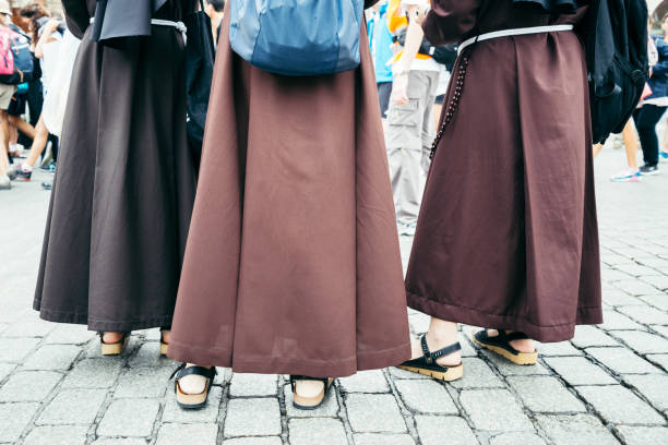 istock nun feet in crowd 840530750