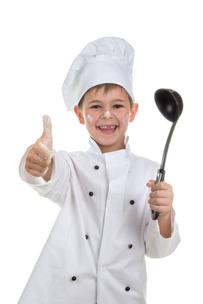 istock Cute playful little chef with soup ladle on white background 840533896