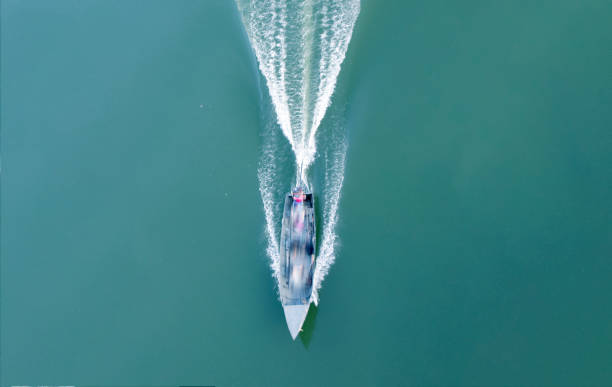 istock Top view long tail boat is running on water. 840539228