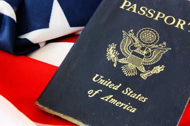 Photo of USA passport on The US flag background