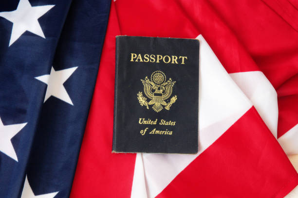 istock USA passport on The US flag background 840546346