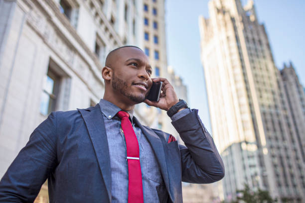 istock Businessman talking on his mobile phone in downtown Chicago 840574316