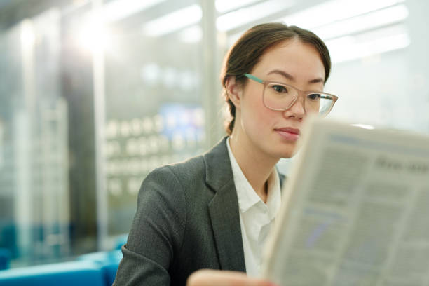 istock Reading financial news 840582754
