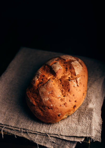istock Loaf of Bread on Cloth. 840590596