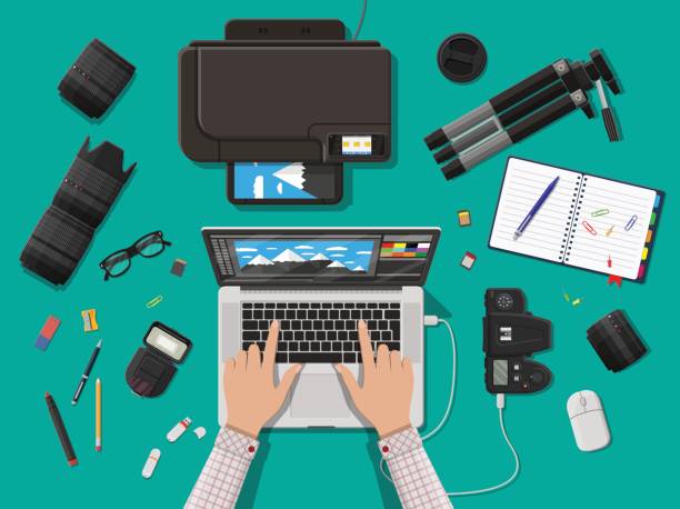 Workspace of photographer. Workspace of photographer. Laptop pc, printer. Modern photo camera, flash, lens and memory card. Professional device for photography. Digital photos and printing. Vector illustration in flat style computer mouse photos stock illustrations