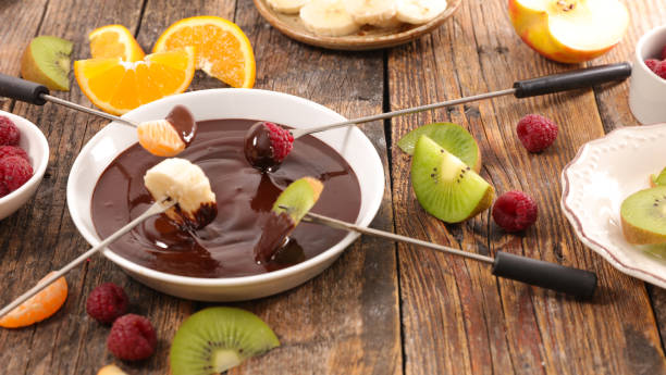 istock chocolate fondue with fruits 840598886