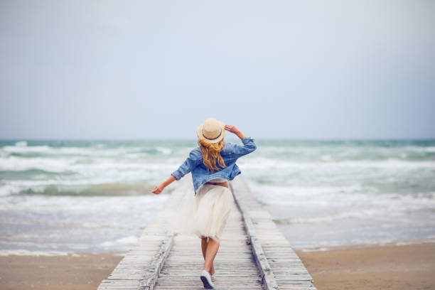 istock Attractive woman enjoying the summer 840599986