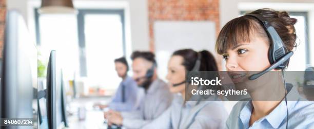 Call Center Worker Accompanied By Her Team Stock Photo - Download Image Now - Call Center, Customer Service Representative, Service