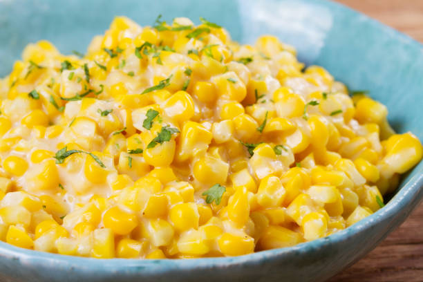 istock Creamy corn in bowl on wooden background 840610310
