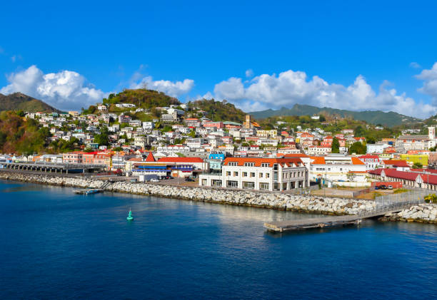 St. George's, Grenada, Caribbean St George's cruise harbor, capital of Grenada, the Caribbean. Waterfront view with beautiful and idyllic town. Panoramic view with bright and colorful colors. grenada stock pictures, royalty-free photos & images