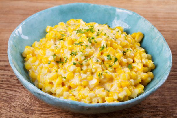 istock Creamy corn in bowl on wooden background 840610976