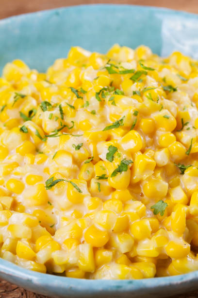 istock Creamy corn in bowl on wooden background 840611268