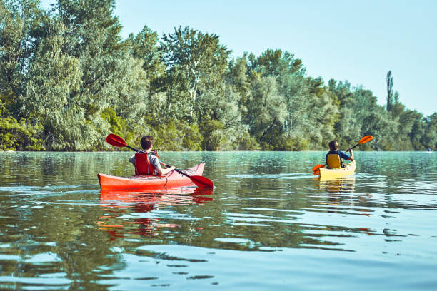 istock A canoe trip along the river along the forest in summer. 840611974