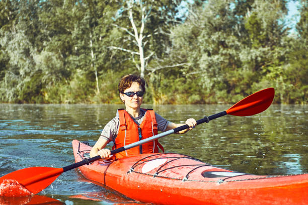 istock A canoe trip along the river along the forest in summer. 840614124