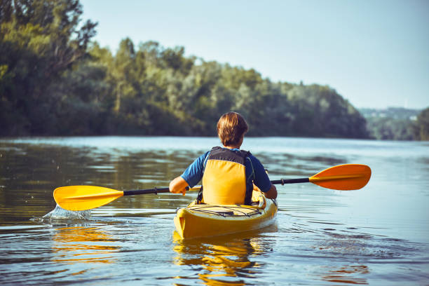 istock A canoe trip along the river along the forest in summer. 840614238