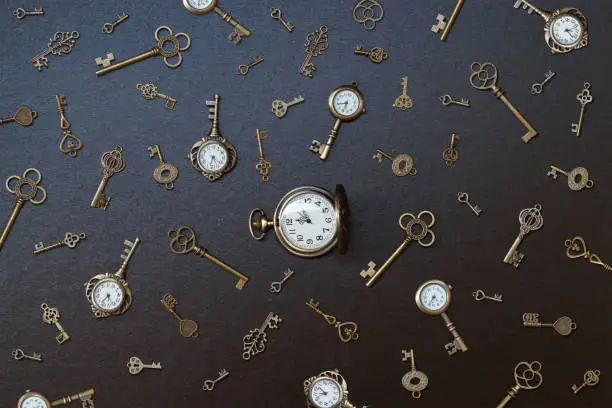pocket watch and old keys. Vintage Wonderland background