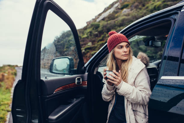 istock Female on road trip having coffee 840622946
