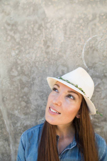 istock Young woman looking up with confidence 840623024